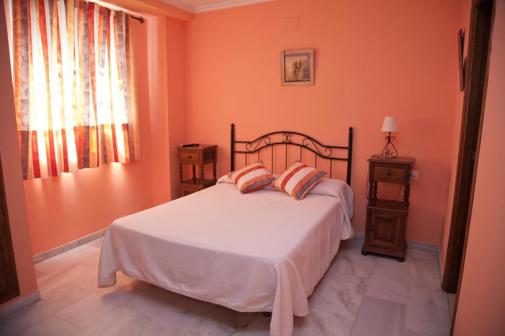 Hostal Niza San Juan Del Puerto Room photo